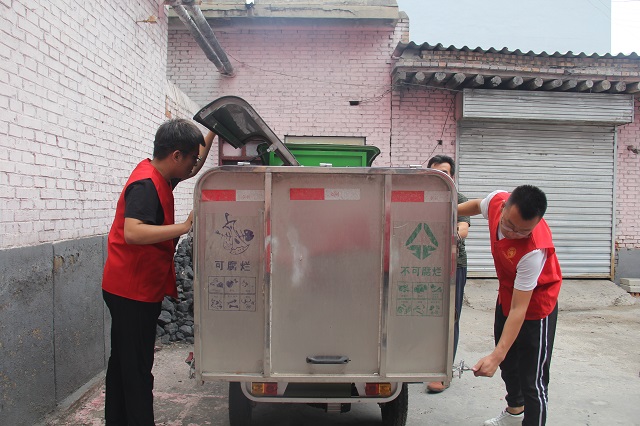 垃圾分类建设忙 绿色胡村在行动