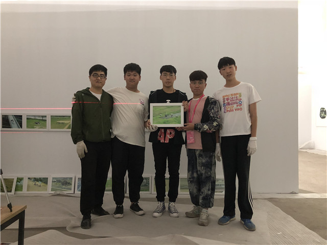 背影之光 续写志愿篇章——记第十八届平遥国际摄影展系列报道(四)