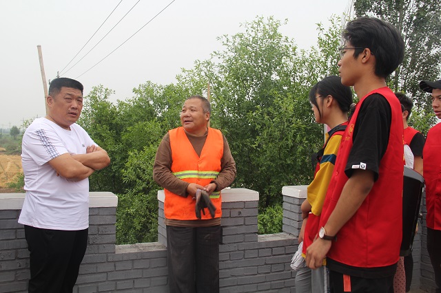 垃圾分类建设忙 绿色胡村在行动